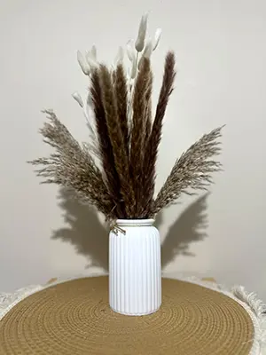 The dried flower vase.