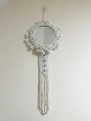 it’s a macramé bohemian-style mirror.